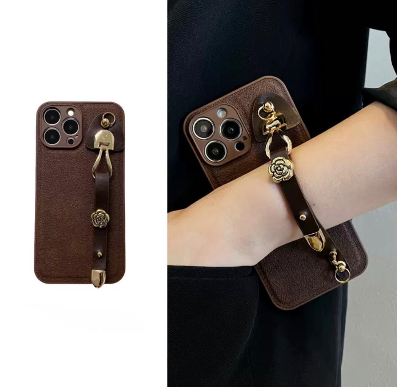 Brown jet case with hand strap for iphone