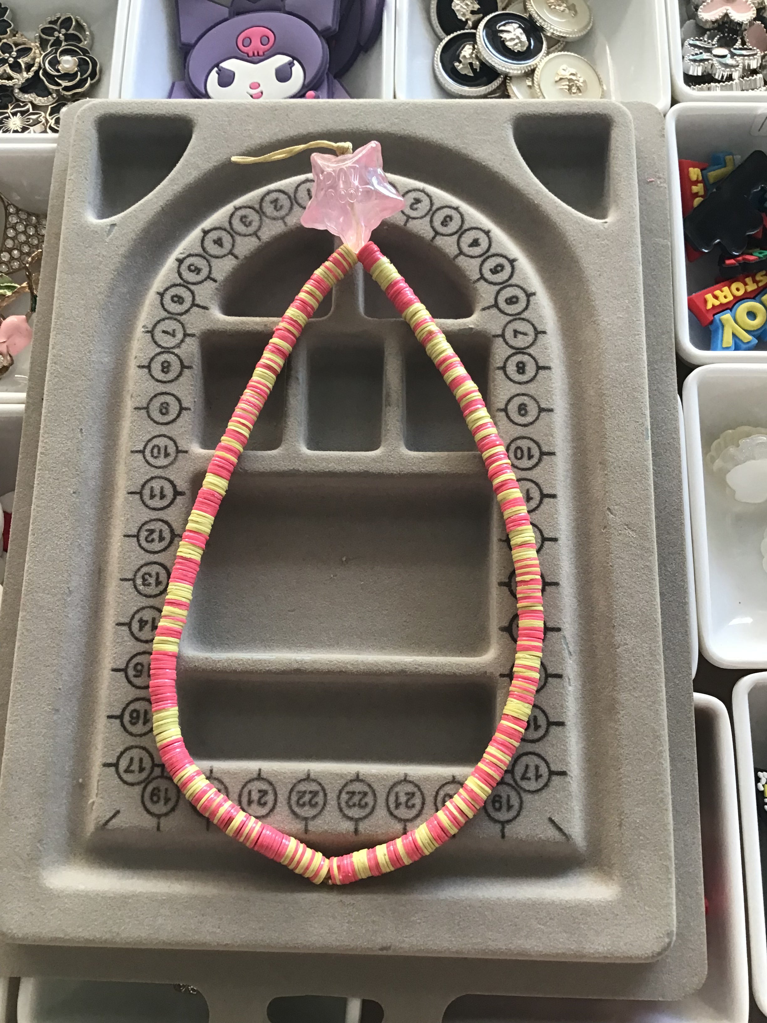 Pink & yellow with star phone charm