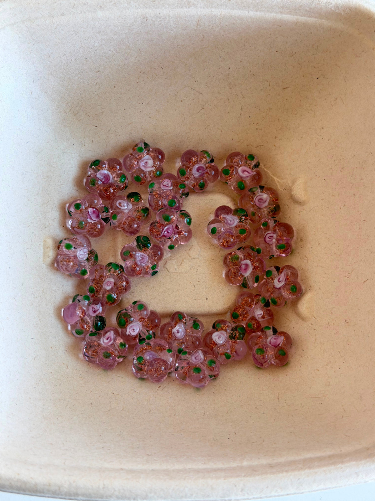 Pink glass flower beads